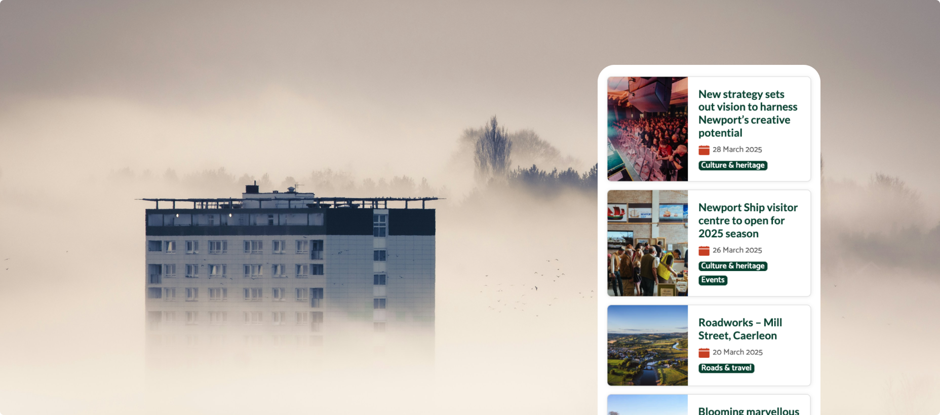 Mobile view of NCC site on a background of a block of flats on a foggy day.