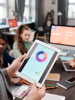 Digital Analytics on an ipad in a meeting