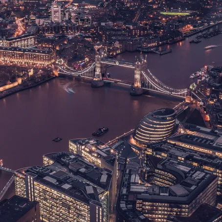 Birdseye view of London and the river Thames at night