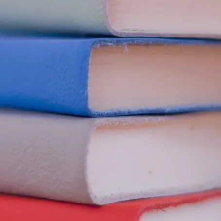 Close up of a pile of books