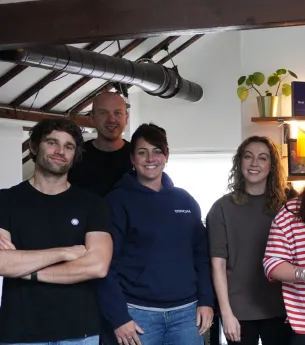 Team photo with balloons 