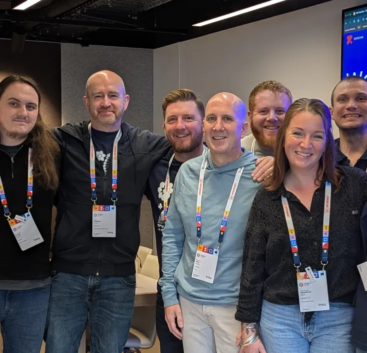 Our team all smiling at Drupalcon