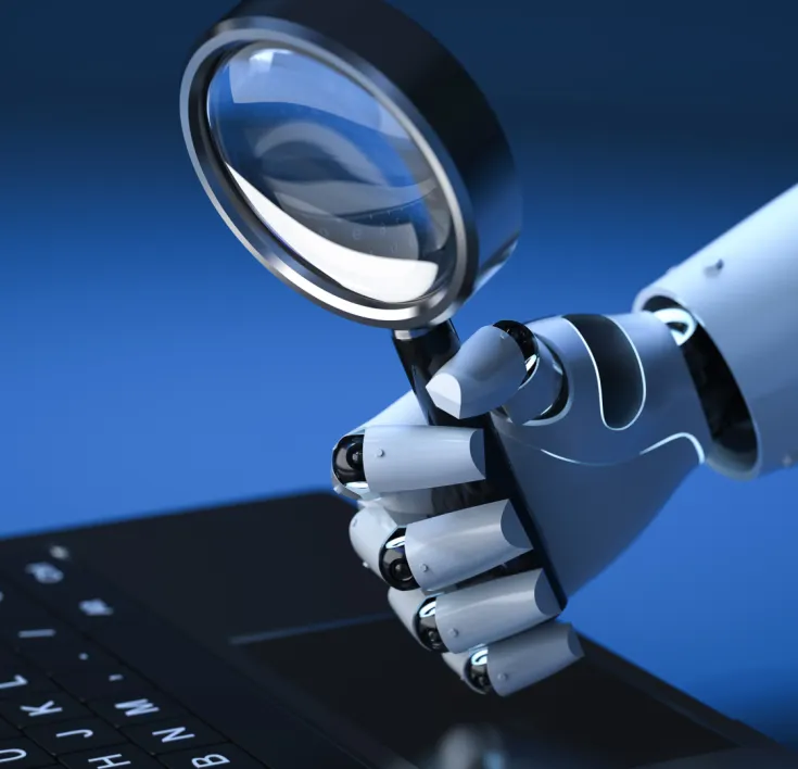 Robotic hand holding a magnifying glass 