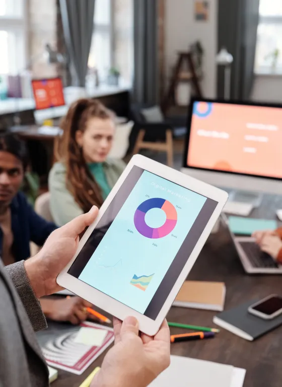Digital Analytics on an ipad in a meeting