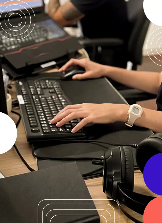 Hands at a desk typing