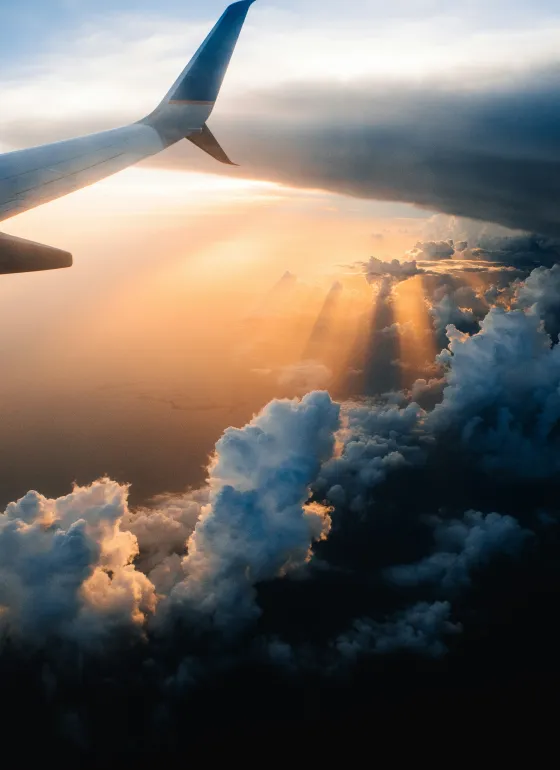 Plane wing and sunset