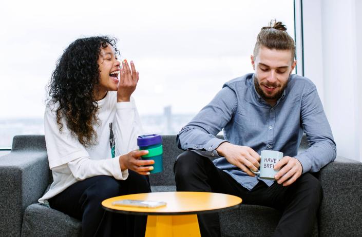 Two students enjoying coffee together 